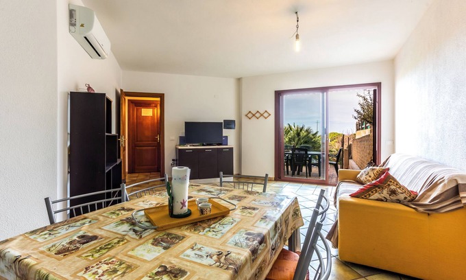 La Muddizza House | Holiday Home 'Casa La Palma Vista Mare' with Sea View, Wi-Fi and Air Conditioning