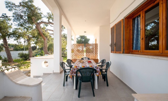 Torre Lapillo House | Holiday Home 'Red Coral' with Sea View, Wi-Fi and Air Conditioning