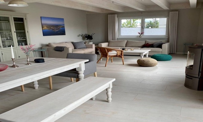 Altwarp House | Holiday home Seenixe with fireplace and water view