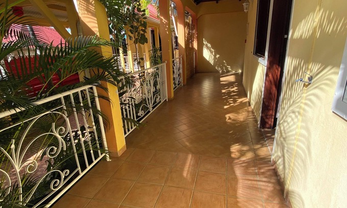 Pointe-Noire Apartment | Homerez - Apt Pointe-Noire - Pool and Jacuzzi