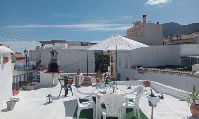 Illar House | Homerez - Charming House in Íllar with Mountain View and Balcony