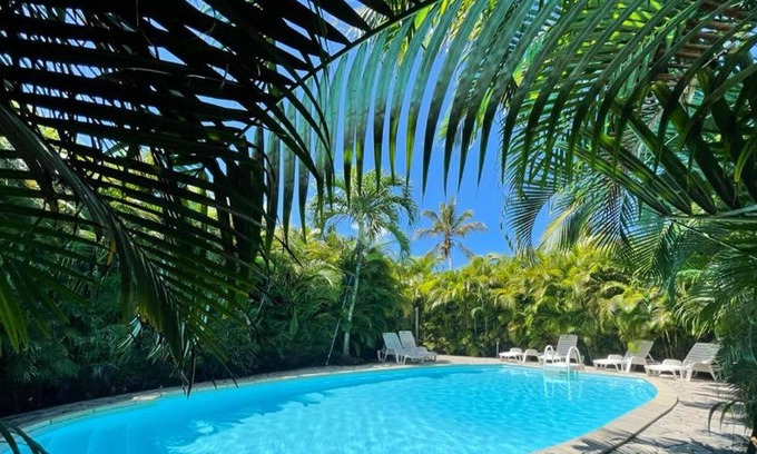 Sainte-Rose House | Homerez - House for 4 ppl. with shared pool, garden and terrace at Sainte-Rose