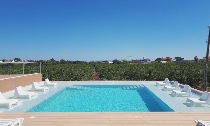 Faro Apartment | Homerez last minute deal - Amazing studio with shared pool