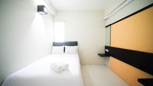 Surabaya Apartment | Homey and Comfy 2BR at Dian Regency Apartment By Travelio