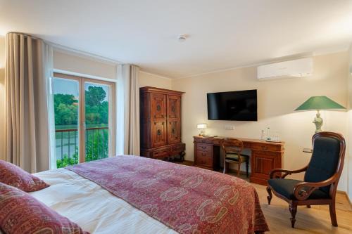 Margetshoechheim Hotel | Hotel Maroggo Schenke Fränkisches Wirtshaus am Main