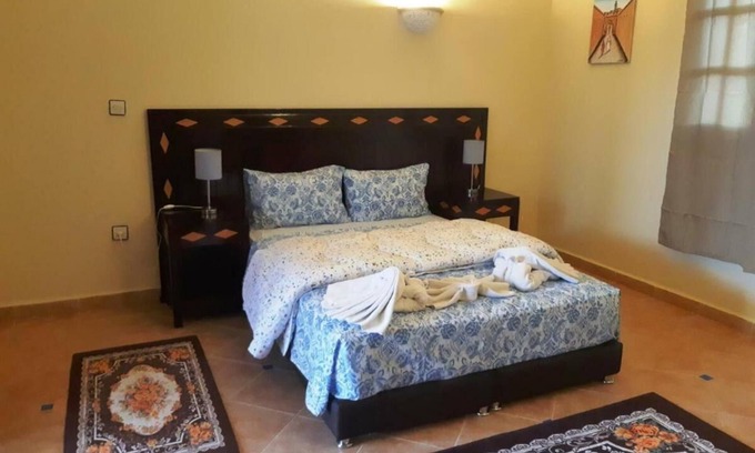 Arset El Bilk Apartment | Hotel Riad H n°117 Luxury bedroom with sofa bed