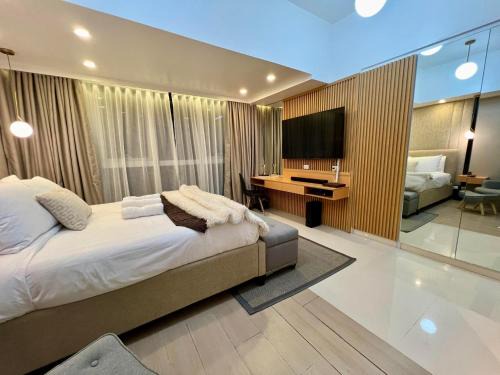 Bonifacio Global City Apartment | Hotel Vibe Condo at Uptown Parksuites BGC