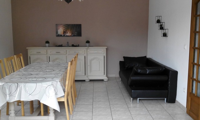 Lens House | House near the Louvre lens and shops