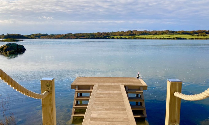 Caergeiliog Cottage | House on the Beach - an on the beach that sleeps 9 guests in 4 bedrooms