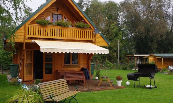 Schumachersiedlung House | Idyllische Holzhütte mit Wasserzugang und Sauna