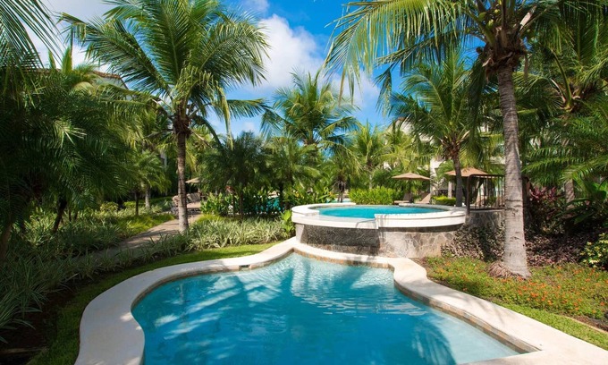 Coco Condo | Impressively designed and decorated 3rd-floor space overlooking pool in Coco