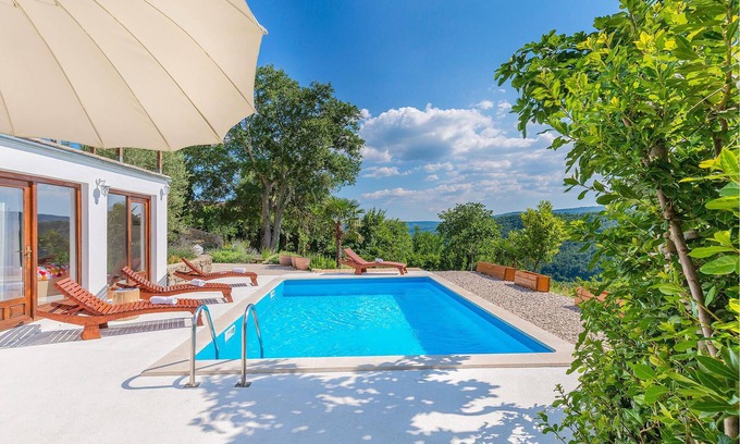 Krbune House | In the interior of Istria, on the gentle green slopes of the small village of Krbuni, you will find