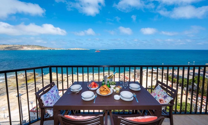 Qawra Apartment | Islet Promenade Seafront Apartment with large Corner Terrace