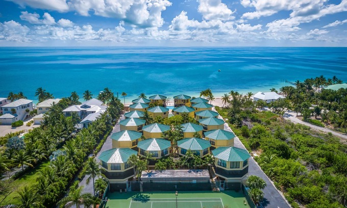 Marathon Villa | KC arrive any-day, swimming beach, full kitchen, boat dock, BBQ, balcony, tennis