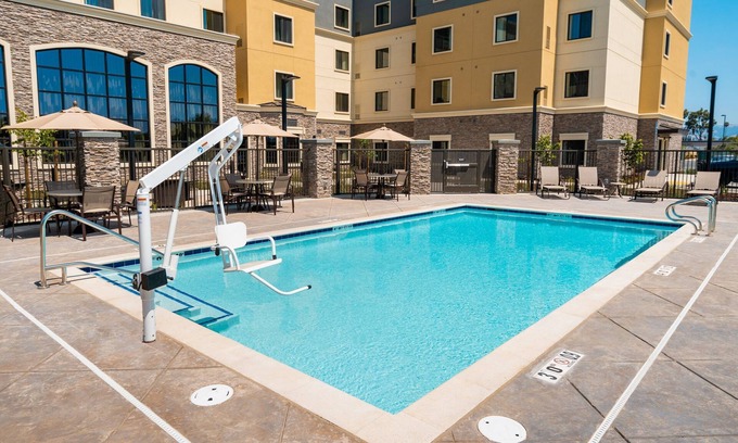 Newark Apartment | King Suite. Free Breakfast. Pool. Shared BBQ. Great for Business Travelers!