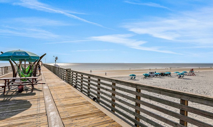 Northside House | Lake-view home with central AC, streaming, washer/dryer, patio, & full kitchen