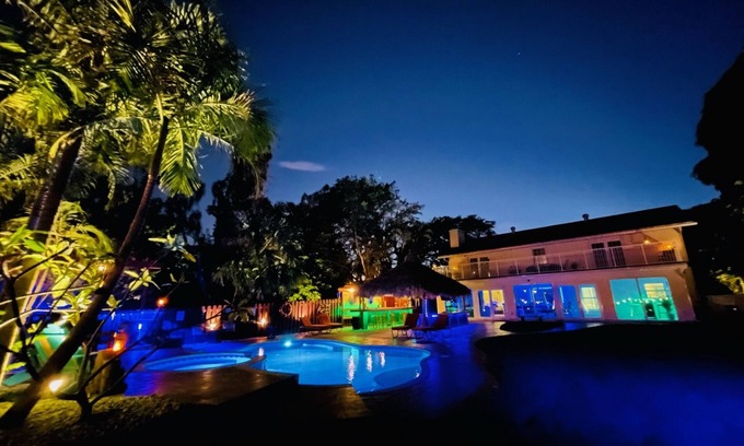 Lake Worth House | Lakefront Oasis for Gatherings - Heated Pool Tiki Huts Game Room Sleep 14