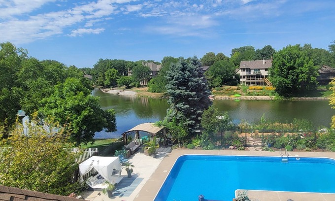 West Omaha House | Lakefront walk-out basement with private Pool, Hot Tub, Sauna and Pool Table 🏖