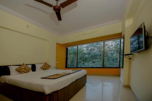 Lokhandwala Complex Hotel | Lalsai Residency Andheri