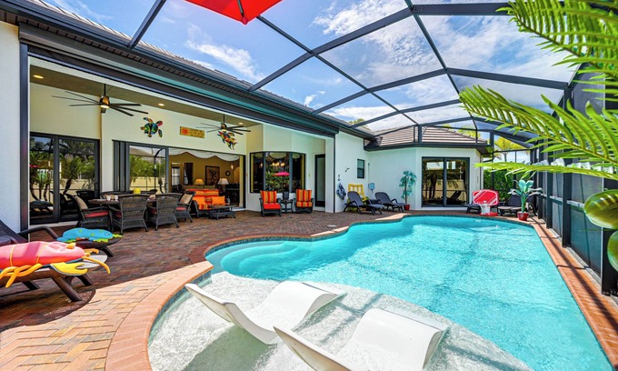 Pelican House | Lanai w/Heated Pool at Cape Coral Escape!