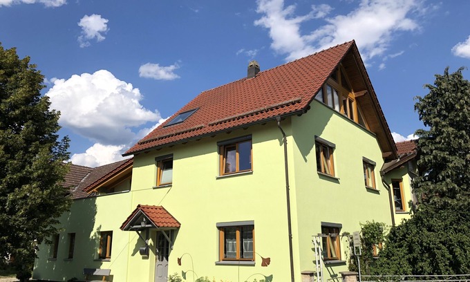 Heckengereuth Condo | Large, cozy vacation apartment by the mountain lake with private sunbathing lawn