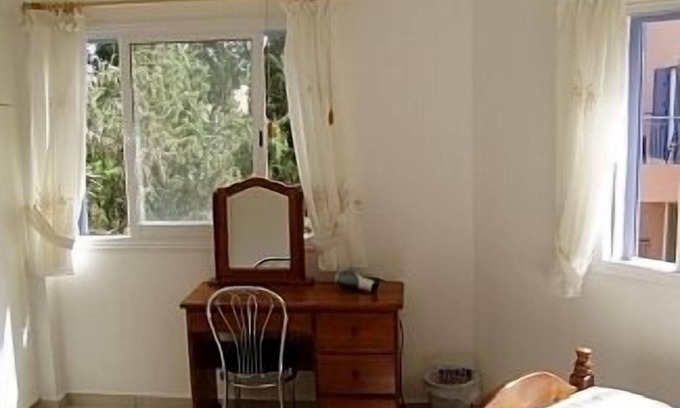 Paphos Apartment | Large sun terrace, balcony, two pools, all major UK TV channels & unlimited wif