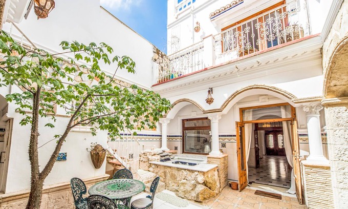 La Font d'en Carros House | Large Valencia townhouse near the sea, with private bar area, courtyard with outdoor Jacuzzi, roof t