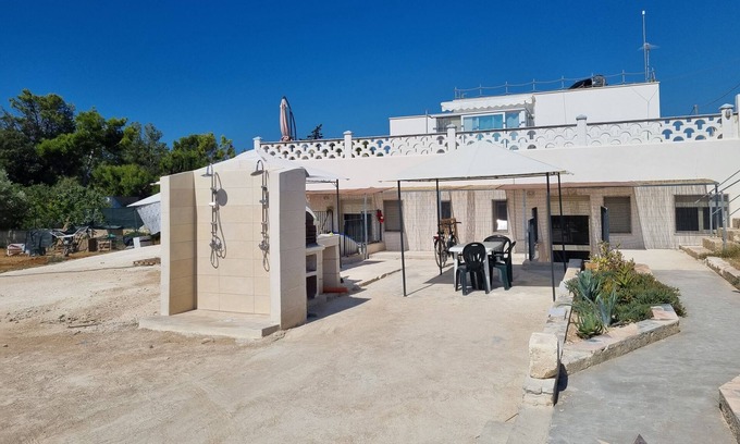 Specchiarica Apartment | le Case di Pat: Palm home, 200mt from the beach and turquoise sea