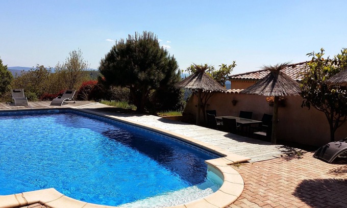 Saint-Andeol-de-Vals Apartment | Le Clos des Mimosas -Les Roses- Gîte 4 pers. Terrace with trees. Shared pool.