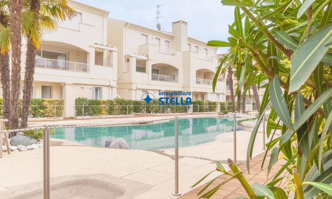 Faro Apartment | Le Tropezien Village *pool and patio*