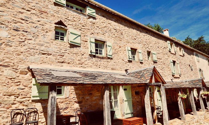 Riols Cottage | Les Coumayres - Rustic and charming farmhouse with panoramic mountain views, immersed in beautiful n