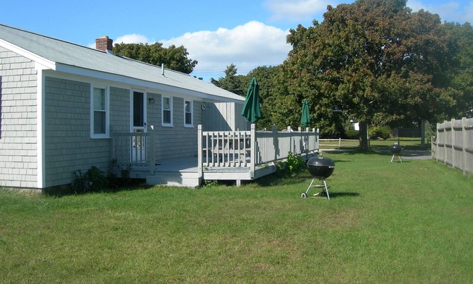 Falmouth Condo | Location, Location! New listing Steps to Surf Drive Beach, sleeps 5,deck, yard