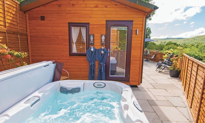 Low Newton Ski Chalet | Lodge with one king-size double with TV.
