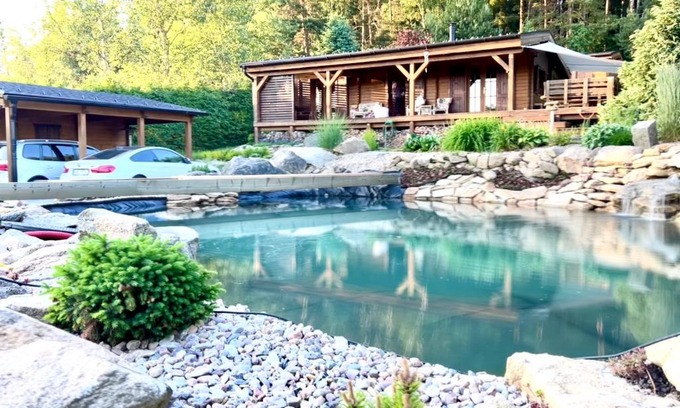 Nova Bystrice Apartment | Log cabins at Iron Rose in Czech Canada