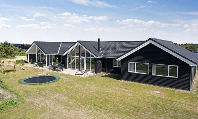 Klegod Strand House | Long drawn activity house with 18 m² swimming pool with slide, wifi and oven