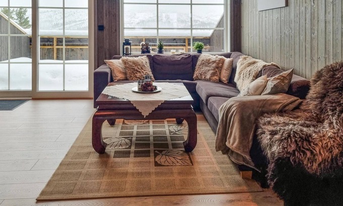 Tjaldal House | Look forward to family time together in this spacious semi-detached house with whirlpool.