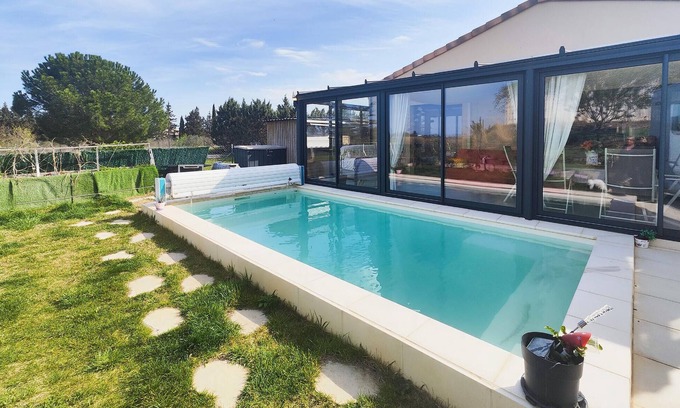 Bessan House | Look forward to this attractive vacation home with conservatory and pool.