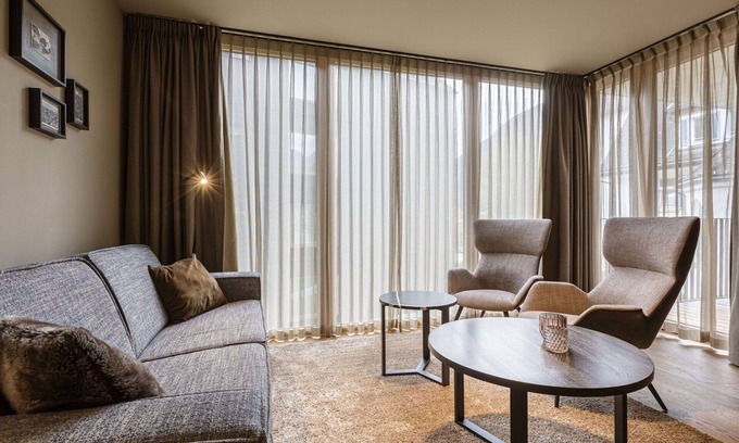 Schruns Apartment | Lovely apartment for 6 people with pool, WIFI, TV and parking