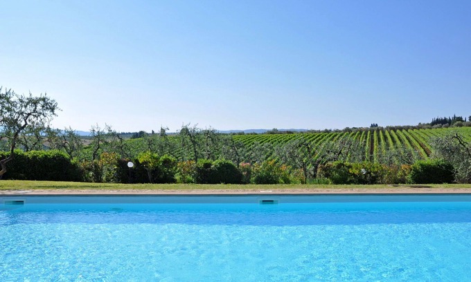 San Pietro in Bossolo Apartment | Lovely apartment with A/C, pool, WIFI, panoramic view and parking, close to Greve In Chianti