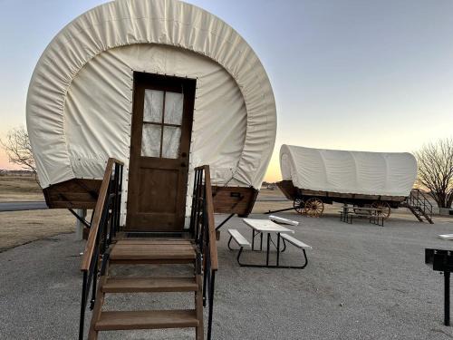 South Oklahoma City House | Lovely Conestoga-Style Covered Wagon for Glorious Glamping on Farm in Oklahoma