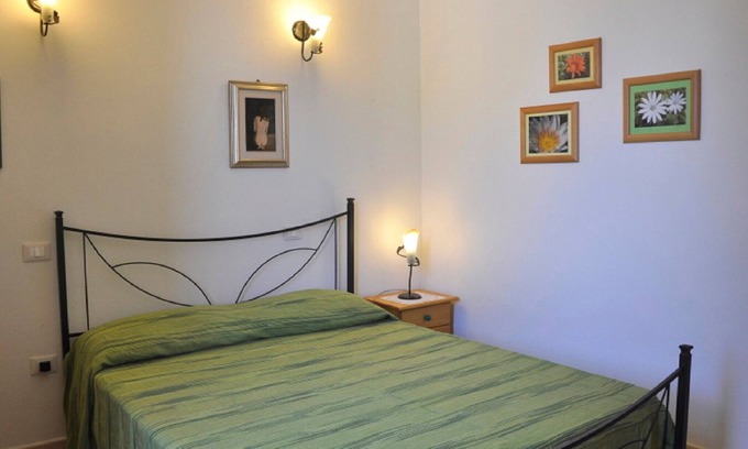 Lu Bagnu Apartment | Lubagnu Vacations -bungalow D with garden and pool perfect for a couple