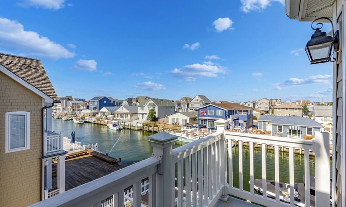 Normandy Beach House | Luxurious 6 bedroom 4.5 bath Waterfront Oasis with Bay Views in Normandy Shores