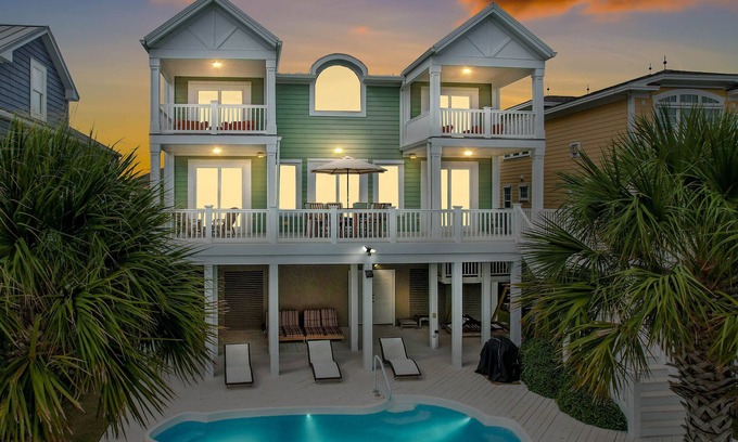 Sunset Beach House | Luxurious Sunset Beach Home On The Water With Pool, Boat Dock and Golf Cart
