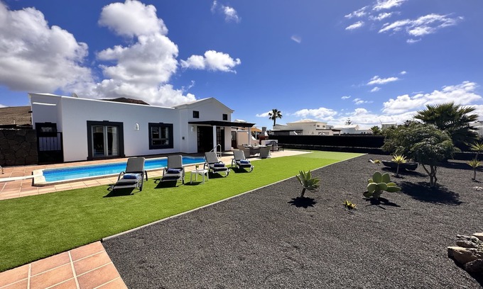 Playa Blanca Villa | Luxury Five star two Bed Villa in Faro Park area with heated pool