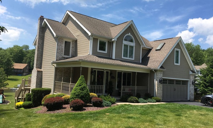 Treasure Lake House | Luxury Lakefront Home: Private dock & outside entertainment areas in resort.