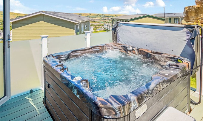 Swanage Ski Chalet | Luxury lodge with one double with en suite shower and one twin.