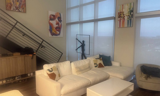 Market District Apartment | Luxury Loft Penthouse in the Heart of the City with Skyline Views – 1BR, 1.5BA