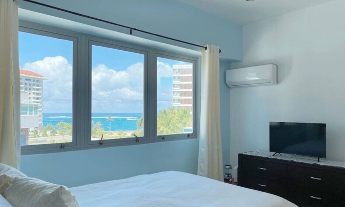 Santurce Apartment | Luxury windows over Condado Beach, San Juan