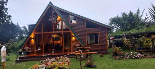 Canton Dota Ski Chalet | Magic Cabin in Jardín de Dota A real Costa Rican Farm experience with Breakfast included Trout fishing in the lagoon Fruit tasting & beautiful garden with farm animals