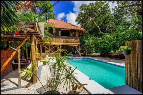 Matapalo House | Matambú Ranchita Charming & Rustic with Shared Pool